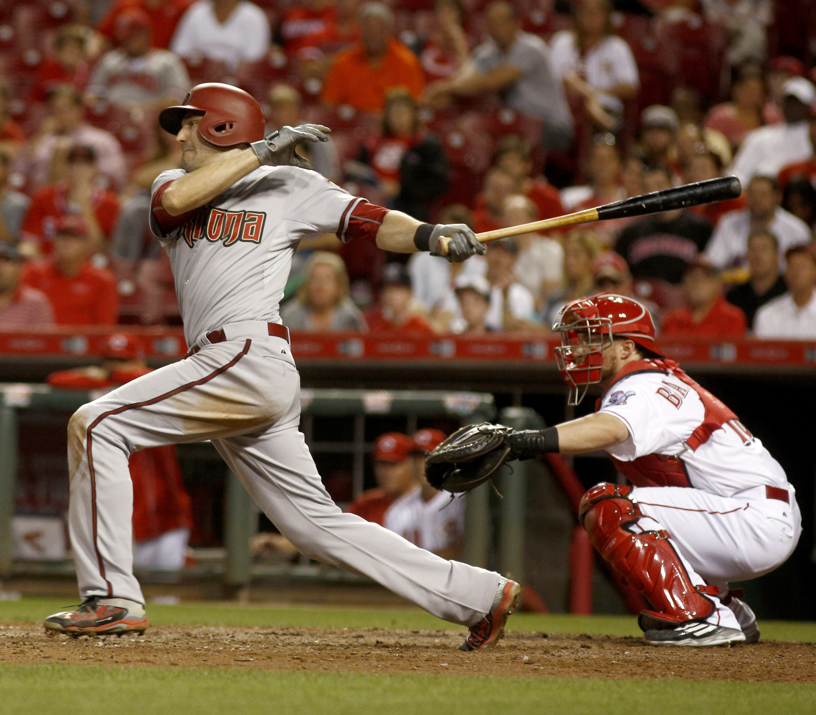 Tucker Barnhart could only watch as a ball went through the webbing of his  glove