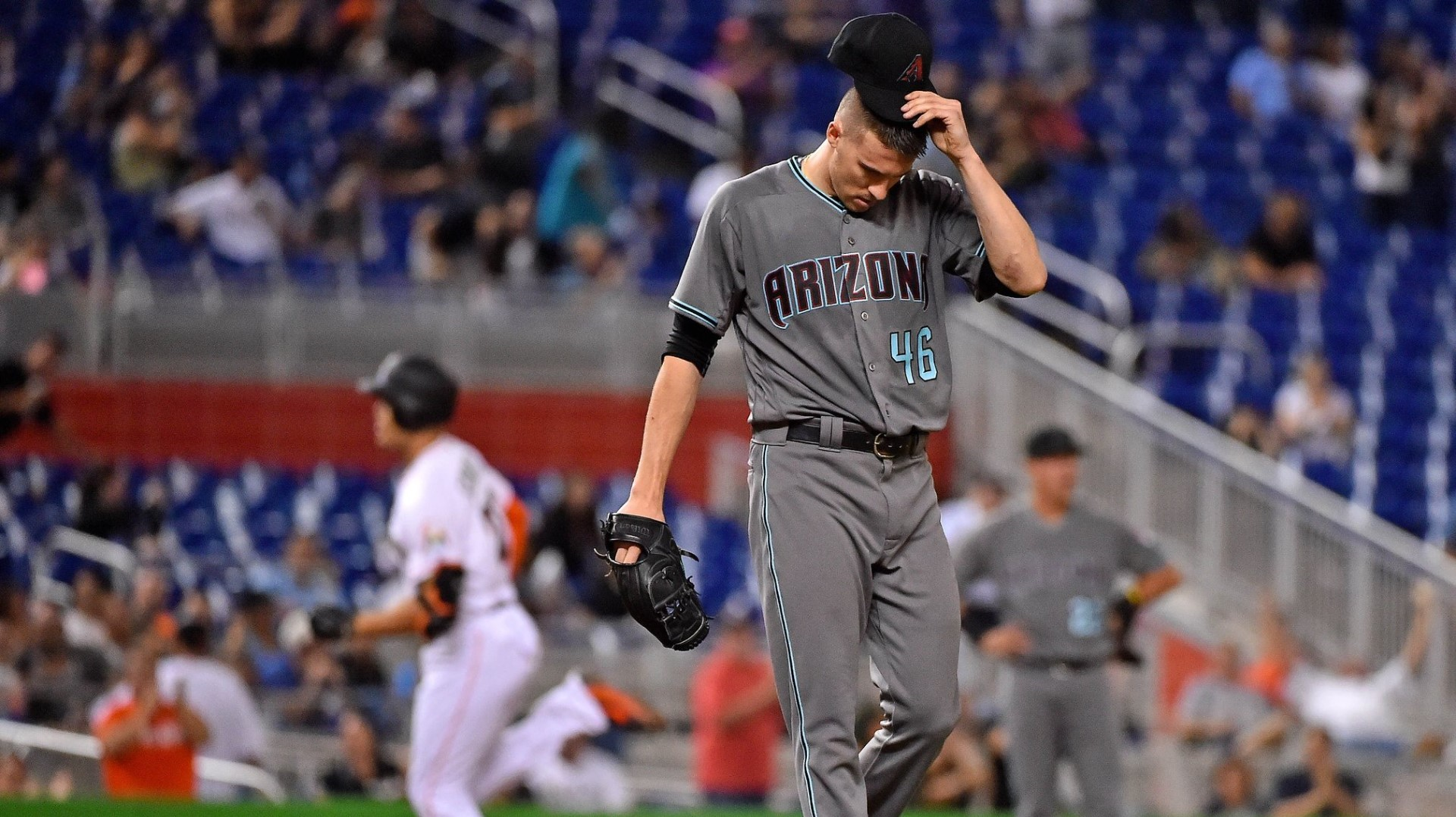 Miami Marlins right fielder Giancarlo Stanton reacts after